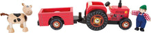 Load image into Gallery viewer, Legler Small Foot Wooden Farm Tractor with Trailer Farmer Cow